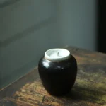 handcrafted black ceramic airtight loose leaf tea canister main product view
