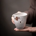 Handcrafted Buddha Clay Gong Dao Bei Tea Pitcher with unique brown seal decor, 8.1 oz capacity for gongfu tea