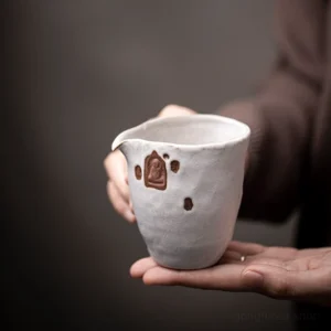 Handcrafted Buddha Clay Gong Dao Bei Tea Pitcher with unique brown seal decor, 8.1 oz capacity for gongfu tea
