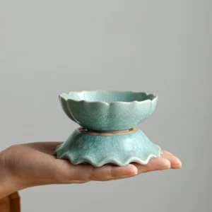 Handcrafted celadon ceramic lotus tea strainer with crackle glaze full product view