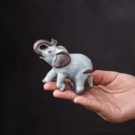 handcrafted ceramic elephant tea pet front view lucky tea table decor