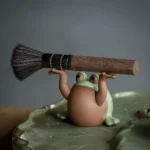 handcrafted ceramic frog tea pet with tea tool holder function on tea table