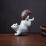 Handcrafted ceramic squirrel tea pet front view on tea tray