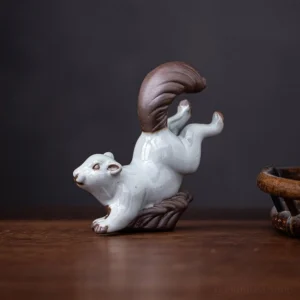 Handcrafted ceramic squirrel tea pet front view on tea tray