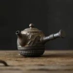 full product view of handcrafted chinese ceramic side handle teapot with built-in strainer
