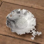 collection of handcrafted decorative nature design tin tea strainer tea filter
