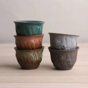 collection of handcrafted embossed floral chawan chinese ceramic tea cups
