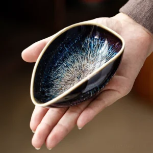 Handcrafted kiln change blue ceramic tea scoop cha he front view