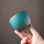 Handcrafted lake blue textured chinese tea cup product main view