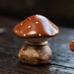 handcrafted lifelike mushroom tea pet on display