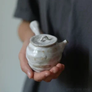 handcrafted textured chinese ceramic side handle teapot main product view