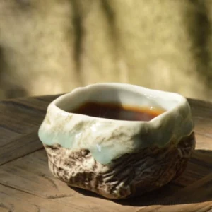 Handcrafted wabi-sabi rock shape chawan ceramic tea bowl side view