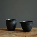 handmade textured black ceramic gong dao bei tea pitcher full view