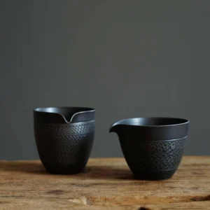 handmade textured black ceramic gong dao bei tea pitcher full view