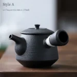 full view of handmade black ceramic chinese kyusu teapot with side handle
