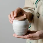 handmade ceramic tea canister front view with natural textured glaze