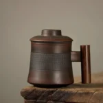handmade ceramic tea mug with wood handle and infuser full product view