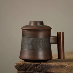 handmade ceramic tea mug with wood handle and infuser full product view