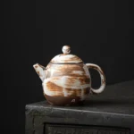 handmade chinese dragon egg ceramic teapot front view