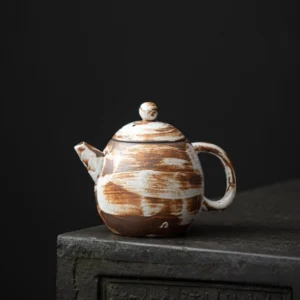 handmade chinese dragon egg ceramic teapot front view