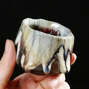 collection of handmade chinese jianzhan tea cups with unique kiln flow glaze patterns