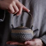 handmade hammered texture chinese tiliang ceramic teapot main view