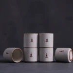 group of stacked handmade chinese zen tea cups rough ceramic