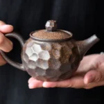 collection view of four styles handmade gilded chinese teapot