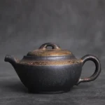 full view of handmade gilded black rough ceramic chinese teapot 6.4oz