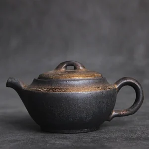 full view of handmade gilded black rough ceramic chinese teapot 6.4oz