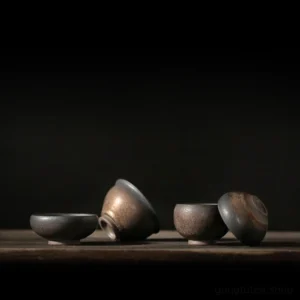 Collection of handmade gilded clay chawan tea bowls in different sizes