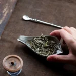 handmade leaf-shaped tin tea scoop and cha ze full set view