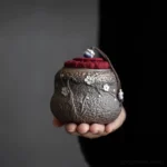 handmade 3d embossed plum blossom ceramic tea canister front view