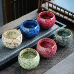 handmade chinese jian zhan tea cup side view, unique crackle glaze ceramic chinese tea cup