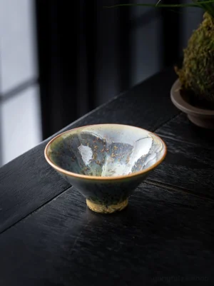 Handcrafted Jian Zhan 3.4oz tea cup side view with golden speckled glazed chawan