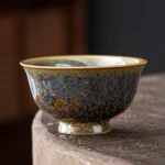 handcrafted jianzhan chawan blue green speckled ceramic tea cup front view