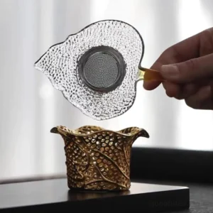 leaf-shaped glass tea strainer with gold plated stand fine mesh tea filter