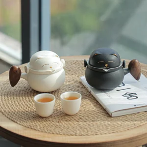 full set view of lucky cat portable ceramic travel tea set with storage bag