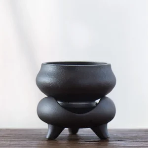matte black ceramic tea strainer with tripod ding stand full product view