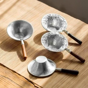 handmade metal tea strainer spoon with wooden handle main product view