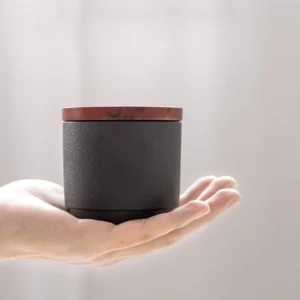 mini matte ceramic tea canister with wood lid side view tea storage