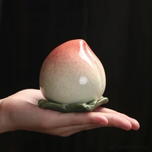 handcrafted ceramic peach shape tea canister sealed tea storage jar main view