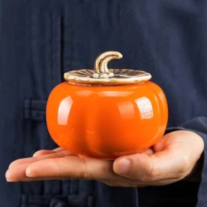 handmade persimmon shaped ceramic tea canister front view