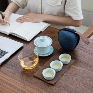 Full portable ceramic kung fu travel tea set 5.1oz with carry bag displayed on wooden table