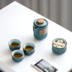 portable ceramic travel tea set closed in black protective carrying case