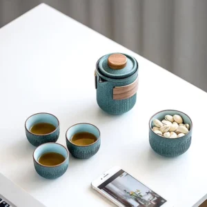 portable ceramic travel tea set closed in black protective carrying case