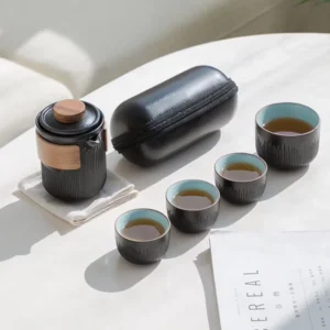 full set view of portable 5.8oz ceramic travel tea set with black carry bag