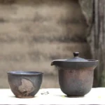 Full view of portable 6.8oz nesting retro rough ceramic travel tea set