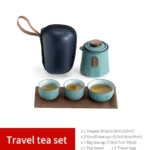 full open view of portable sage green ceramic travel tea set with carry bag