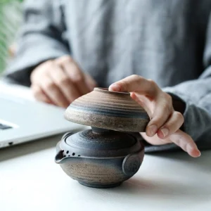 Nested handheld ceramic portable travel tea set one pot one cup